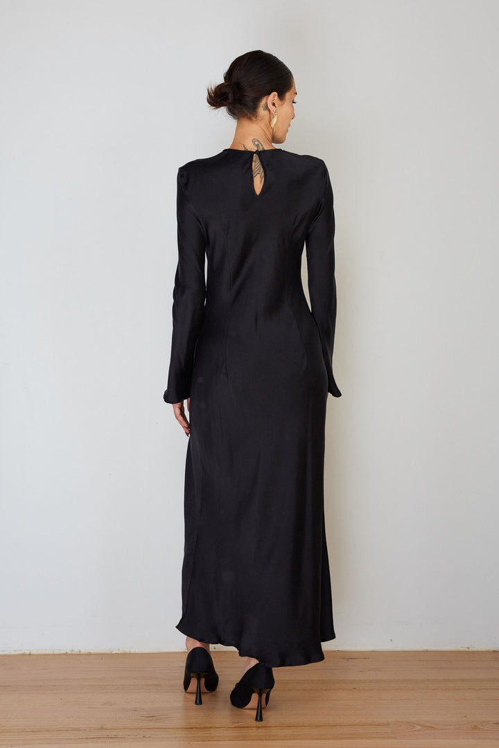 Model wearing the Monument Dress by Ralf Studios in plain Black