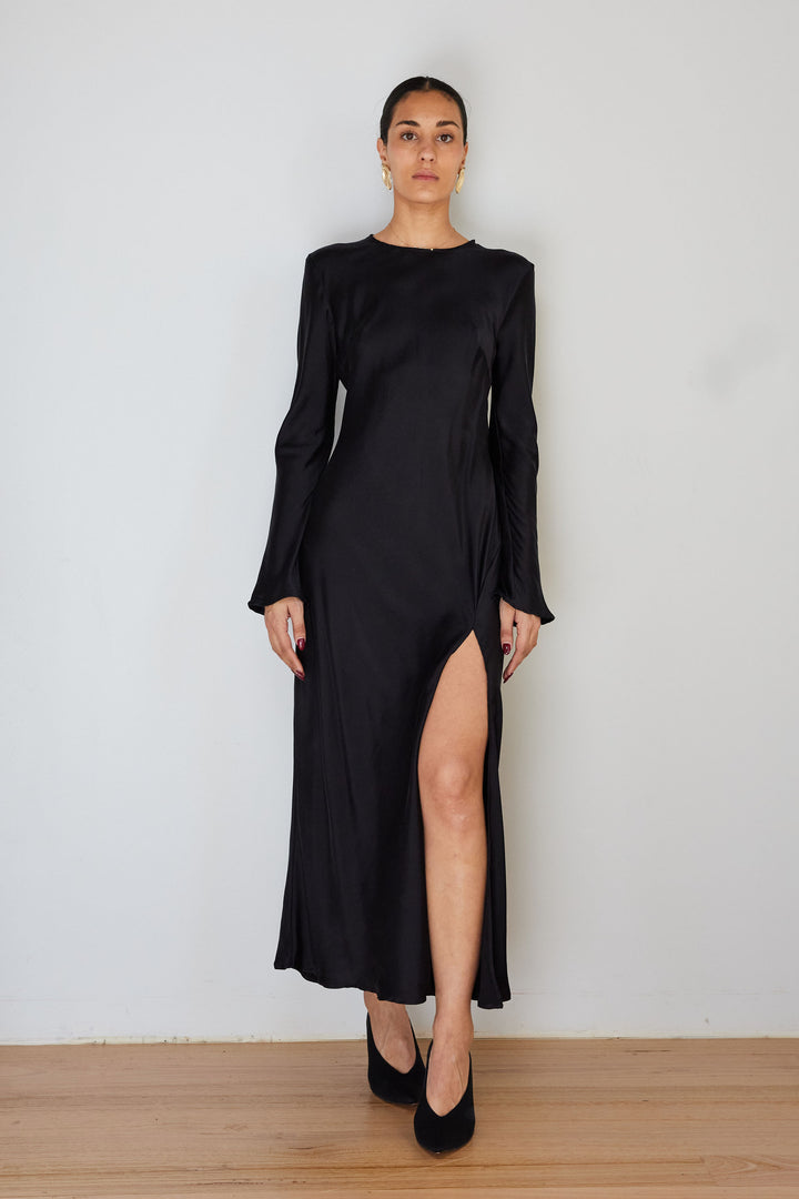 model wearing black 100% silk dress 